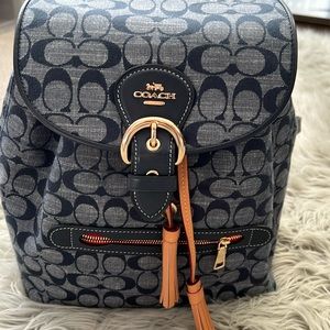 Coach denim back pack medium size
